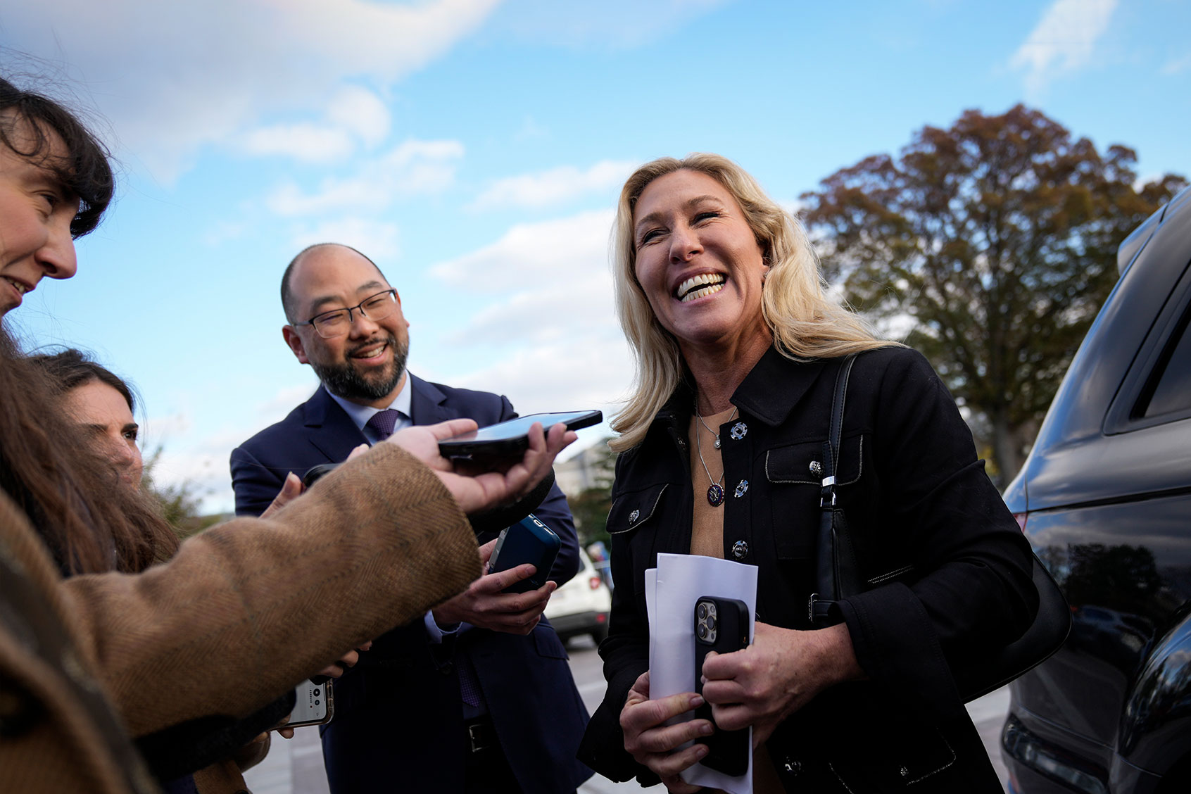Rep. Marjorie Taylor Greene (R-GA) speaks to reporters as she leaves the U.S. Capitol. (Drew Angerer/Getty Images)