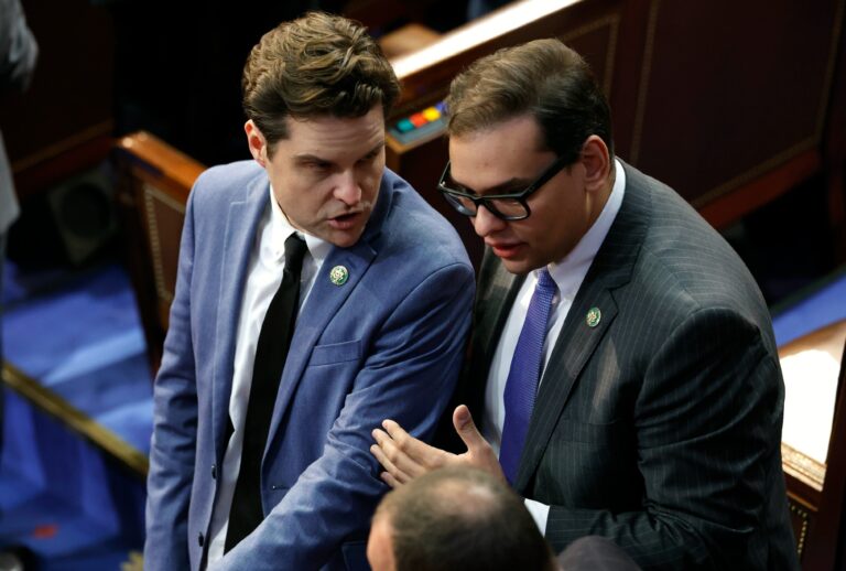U.S. Rep.-elect Matt Gaetz (R-FL) (L) talks to Rep.-elect George Santos (R-NY) in the House Chamber during the second day of elections for Speaker of the House at the U.S. Capitol Building on January 04, 2023 in Washington, DC. (Chip Somodevilla/Getty Images)