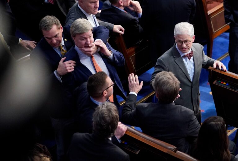 Mike Rogers (R-AL) is restrained after getting into an argument with Matt Gaetz (R-FL) during in the 14th round of voting for speaker in a meeting of the 118th Congress, Friday, January 6, 2023, at the U.S. Capitol in Washington DC. (Jabin Botsford/The Washington Post via Getty Images)