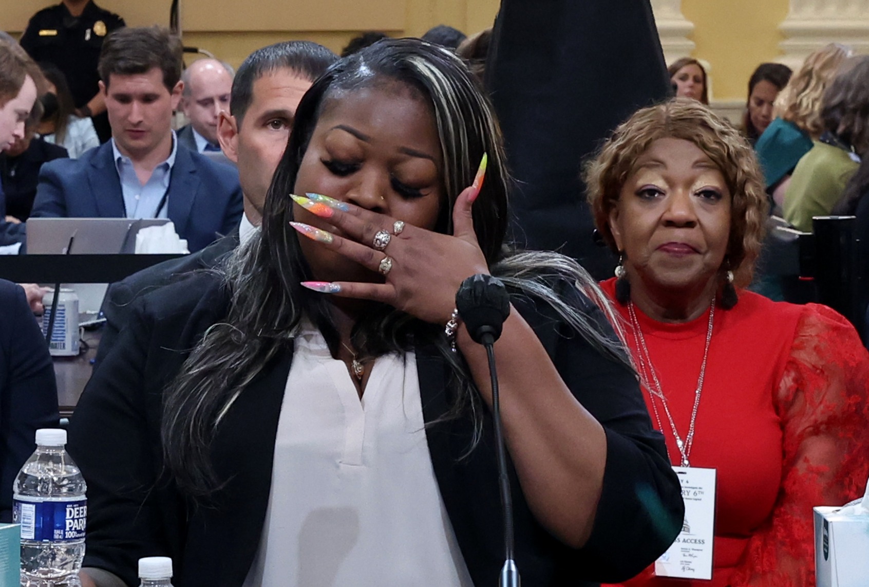 Wandrea ArShaye “Shaye” Moss, former Georgia election worker, becomes emotional while testifying as her mother Ruby Freeman watches during the fourth hearing held by the Select Committee to Investigate the January 6th Attack on the U.S. Capitol on June 21, 2022 in the Cannon House Office Building in Washington, DC. (Michael Reynolds-Pool/Getty Images)