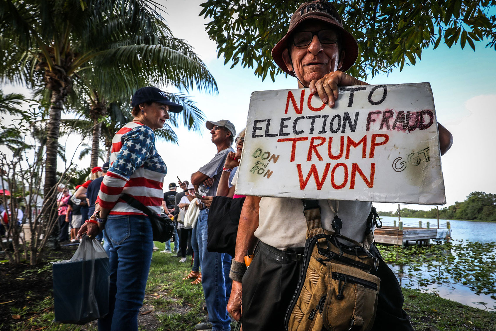 Supporters of former US President Donald Trump wait outside of Trump's President's Day event at the Hilton Palm Beach Airport in West Palm Beach, Florida, on February 20, 2023. (GIORGIO VIERA/AFP via Getty Images)