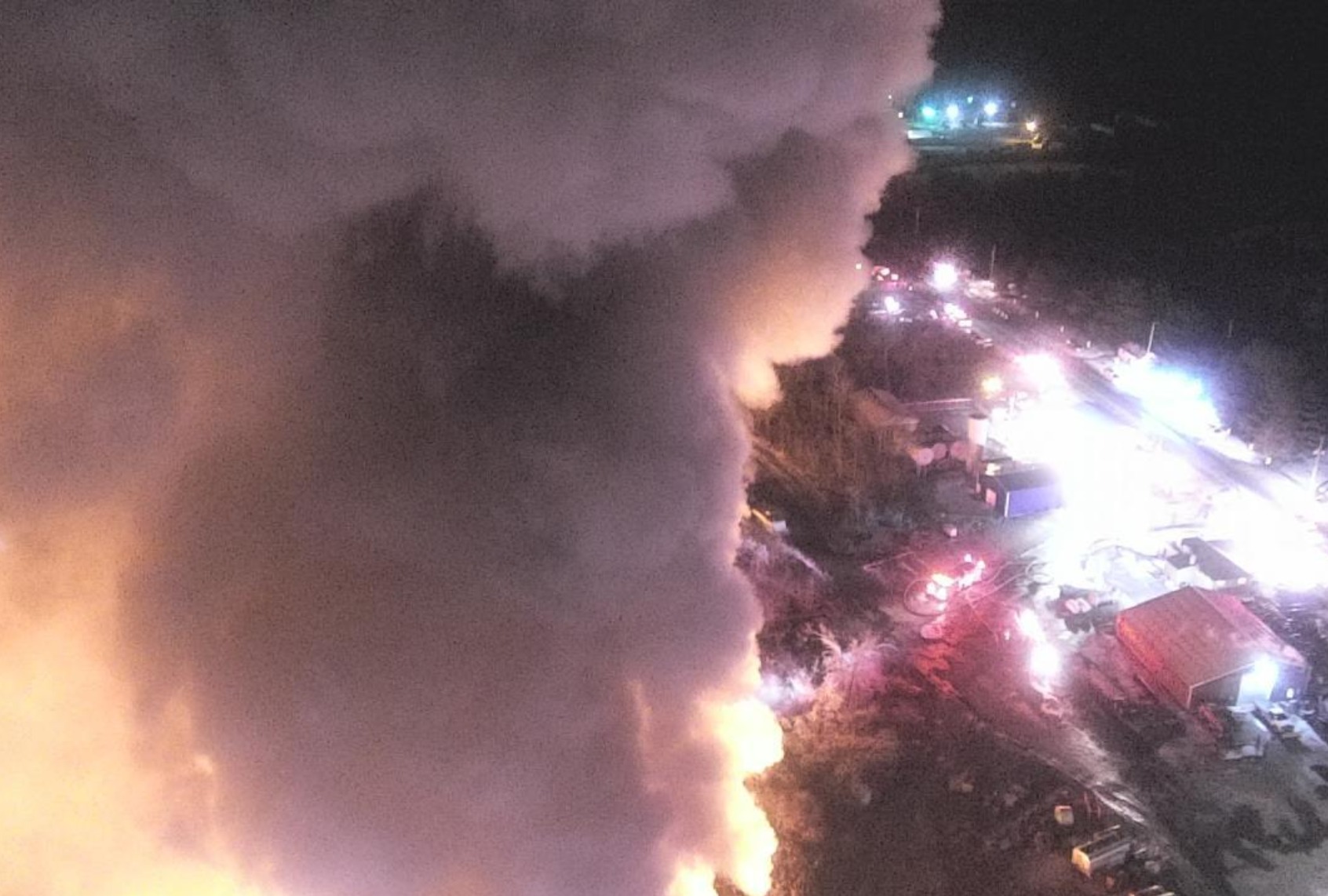 Smoke and flames rise after the train derailment in East Palestine, Ohio, United States on February 17, 2023. The train derailment happened on Feb. 3 in which 38 cars derailed, including 11 containing hazardous materials, forcing hundreds of residents to evacuate for several days. (US Environmental Protection Agency / Handout/Anadolu Agency via Getty Images)