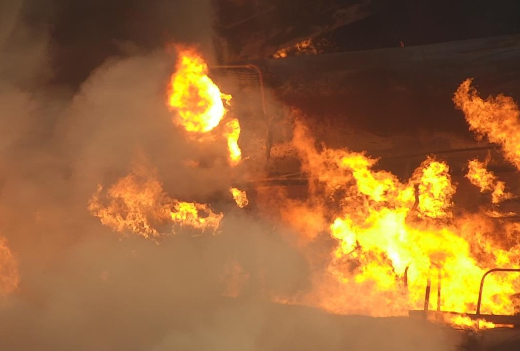 Smoke and flames rise after the train derailment in East Palestine, Ohio, United States on February 17, 2023. The train derailment happened on Feb. 3 in which 38 cars derailed, including 11 containing hazardous materials, forcing hundreds of residents to evacuate for several days. (Photo by US Environmental Protection Agency / Handout/Anadolu Agency via Getty Images)