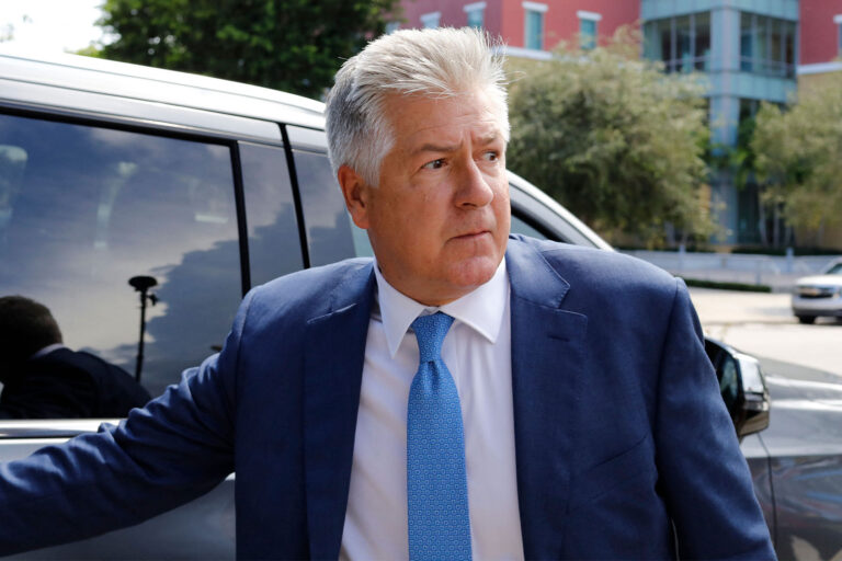 Evan Corcoran, part of former U.S. President Donald Trumps legal team, leaves the Paul G. Rogers Federal Building & Courthouse after a hearing in West Palm Beach, Florida, on September 1, 2022. (MARCO BELLO/AFP via Getty Images)