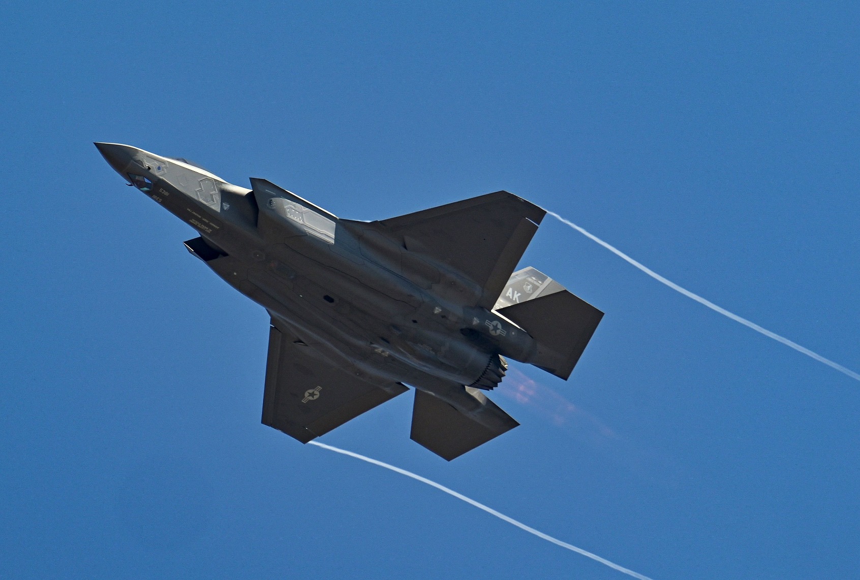 A US Air Force (USAF) fifth-generation supersonic multirole F-35 fighter jet flies past during a flying display on February 14, 2023. (MANJUNATH KIRAN/AFP via Getty Images)