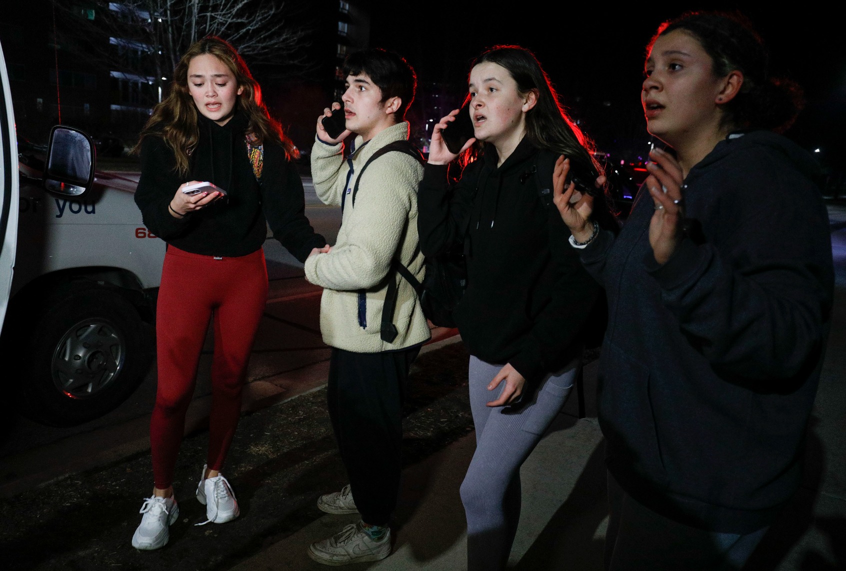Michigan State University students react during an active shooter situation on campus on February 13, 2023 in Lansing, Michigan. (Bill Pugliano/Getty Images)