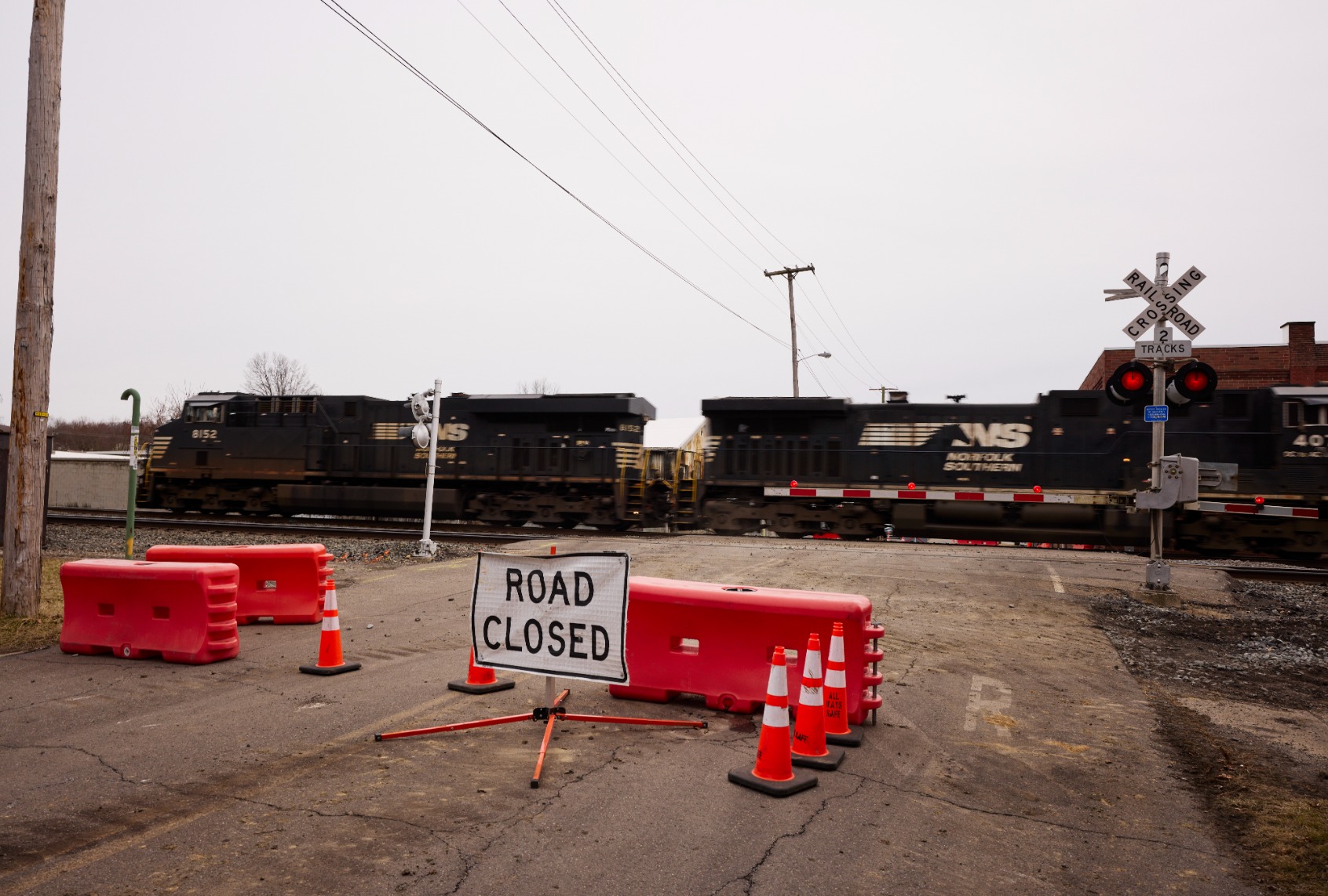 A Norfolk Southern train is en route near where another train by the company derailed, on February 14, 2023 in East Palestine, Ohio. The derailment occurred on February 3, releasing toxic fumes and forcing evacuation of residents. (Angelo Merendino/Getty Images)