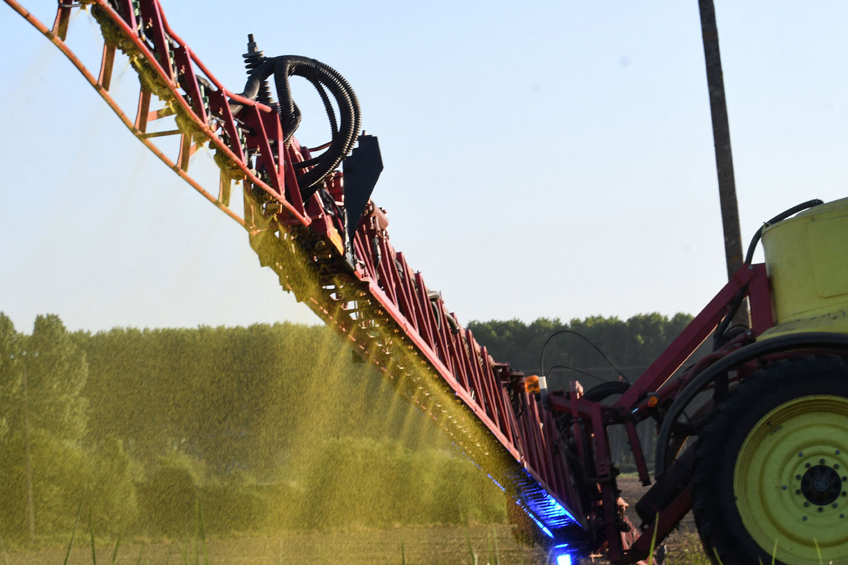 French farmer Nicolas Denieul sprays Roundup 720 glyphosate herbicide produced by US agrochemical giant Monsanto on May 11, 2018, on a field of no-till corn in Piace, northwestern France. (JEAN-FRANCOIS MONIER/AFP via Getty Images)