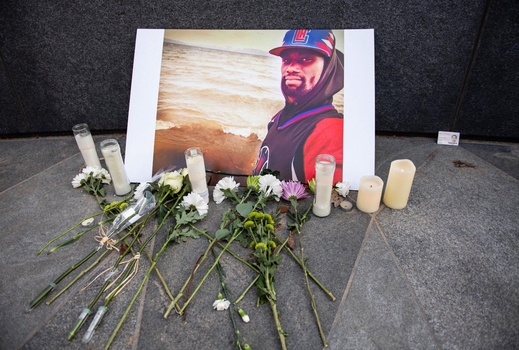 A memorial is displayed for Tyre Nichols at the Embrace statue in Boston, Massachusetts, on January 28, 2023. (JOSEPH PREZIOSO/AFP via Getty Images)