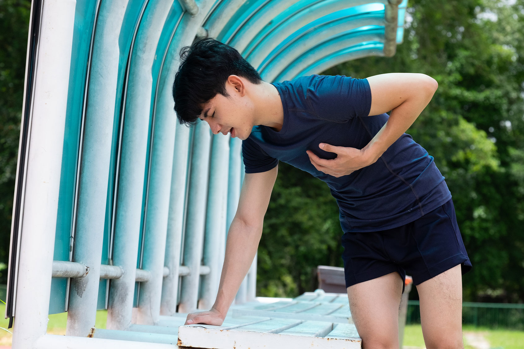 Young man suffering from heart attack (Getty Images/mdaffodil/500px)