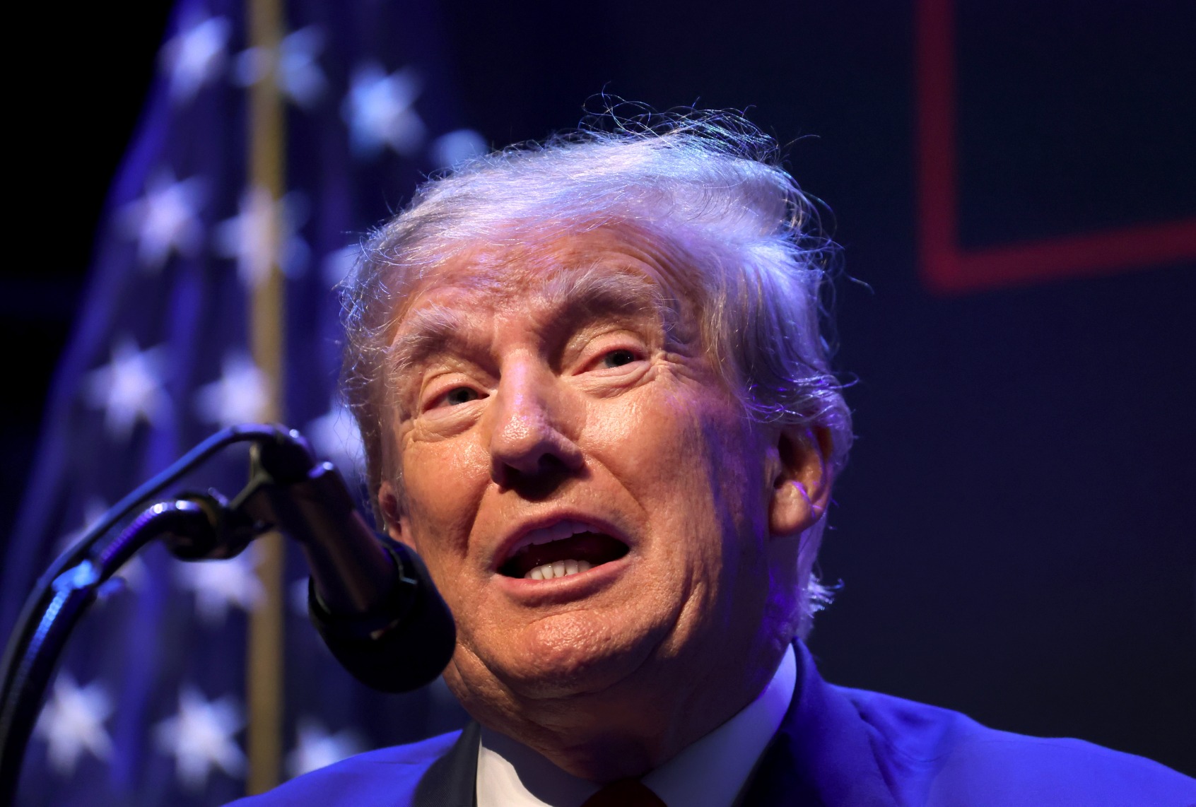 Former President Donald Trump speaks to guests gathered for an event at the Adler Theatre on March 13, 2023 in Davenport, Iowa. (Scott Olson/Getty Images)