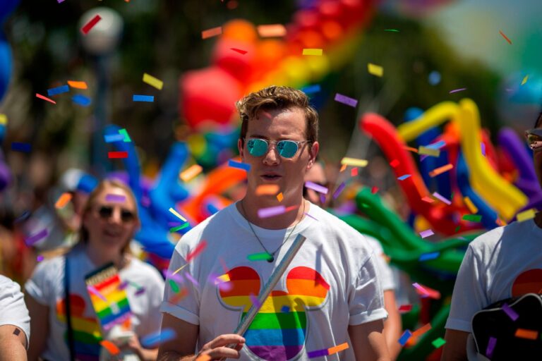 People from the Walt Disney Company participate in the annual LA Pride Parade in West Hollywood, California. (DAVID MCNEW/AFP via Getty Images)