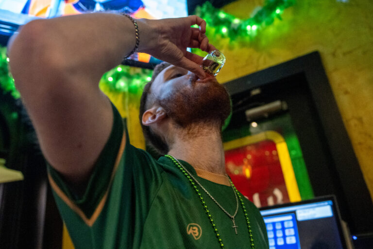 A scene at the Playwright Irish Pub in Manhattan after the 2022 St. Patrick's Day Parade. (Alexi Rosenfeld/Getty Images)