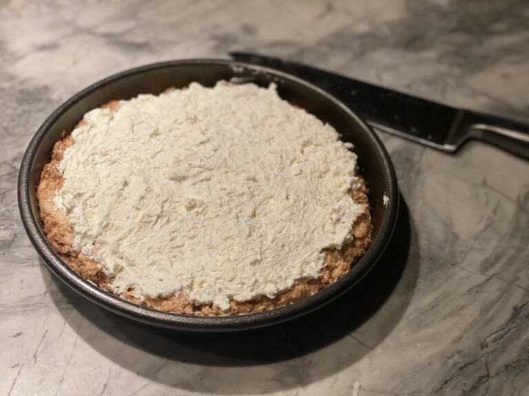A coconut torte by Bibi Hutchings in a round pan. (Bibi Hutchings)