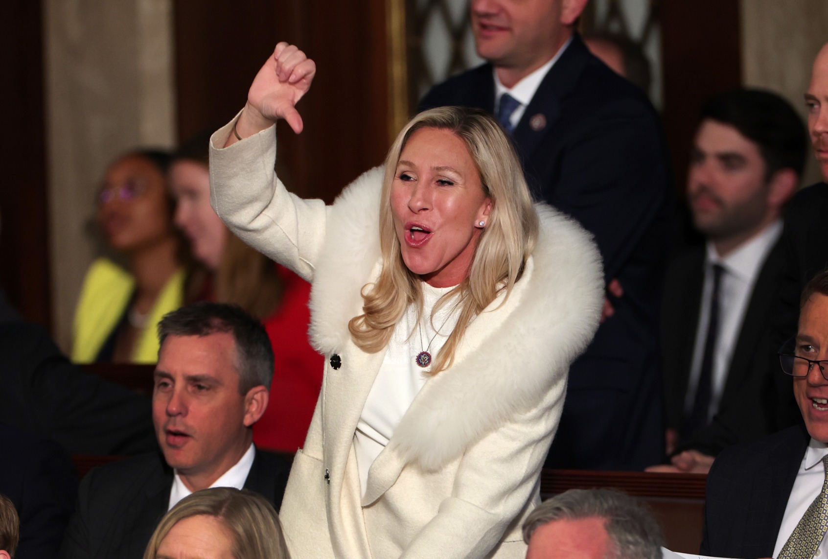 Rep. Marjorie Taylor Greene (R-GA) gives a thumbs down during President Joe Biden's State of the Union address during a joint meeting of Congress in the House Chamber of the U.S. Capitol on February 07, 2023 in Washington, DC. (Win McNamee/Getty Images)