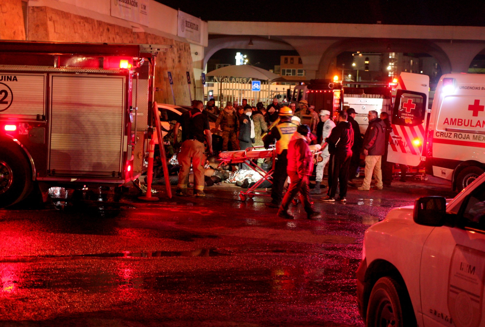 Rescuers work to take victims out of the premises after a fire at an immigration detention center in Northern Mexico on March 28, 2023 in Ciudad Juarez, Mexico. (Juan Ortega/Getty Images)