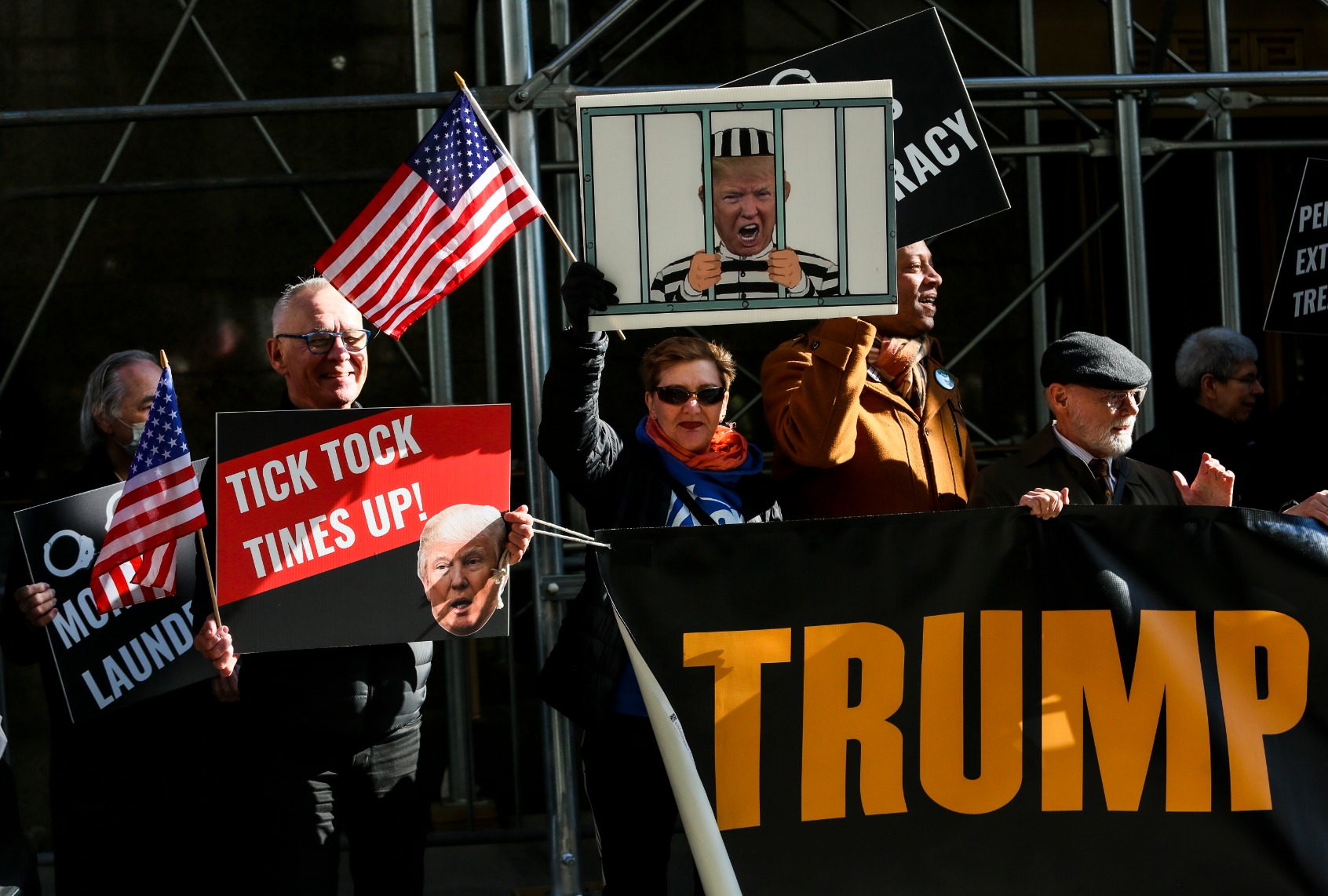 Protesters gather outside Manhattan Criminal Court as a grand jury is expected to vote this week on whether to indict former President Donald Trump on March 21, 2023 in New York City. (Pablo Monsalve/VIEWpress via Getty Images)