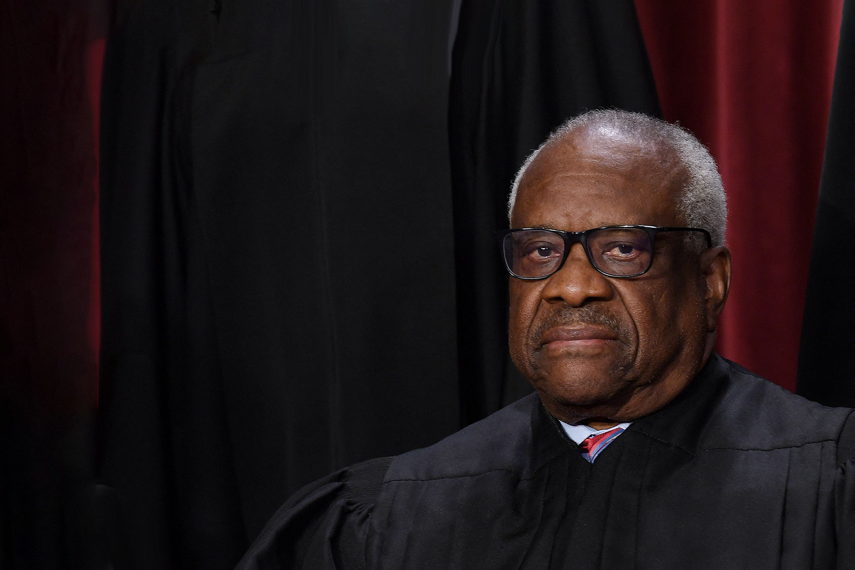 Associate US Supreme Court Justice Clarence Thomas poses for the official photo at the Supreme Court in Washington, DC on October 7, 2022. (OLIVIER DOULIERY/AFP via Getty Images)