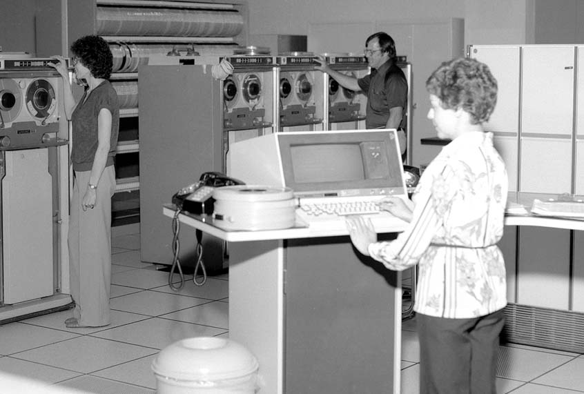 Computer room and workers ca. 1980. (HUM Images/Universal Images Group via Getty Images)