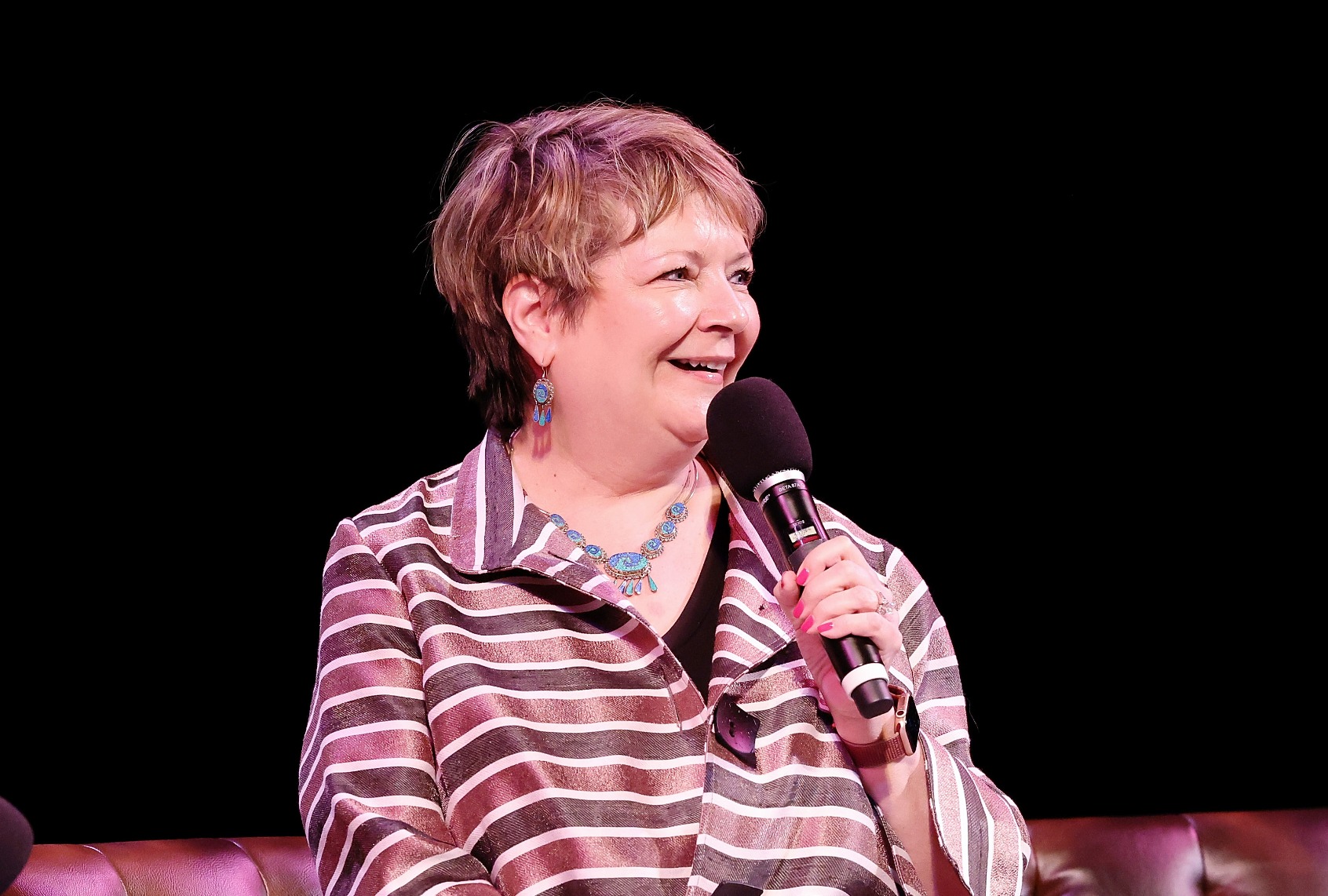 Judge Janet Protasiewicz speaks onstage during live taping of "Pod Save America," at the Barrymore Theater on March 18, 2023 in Madison, Wisconsin. (Jeff Schear/Getty Images for WisDems)