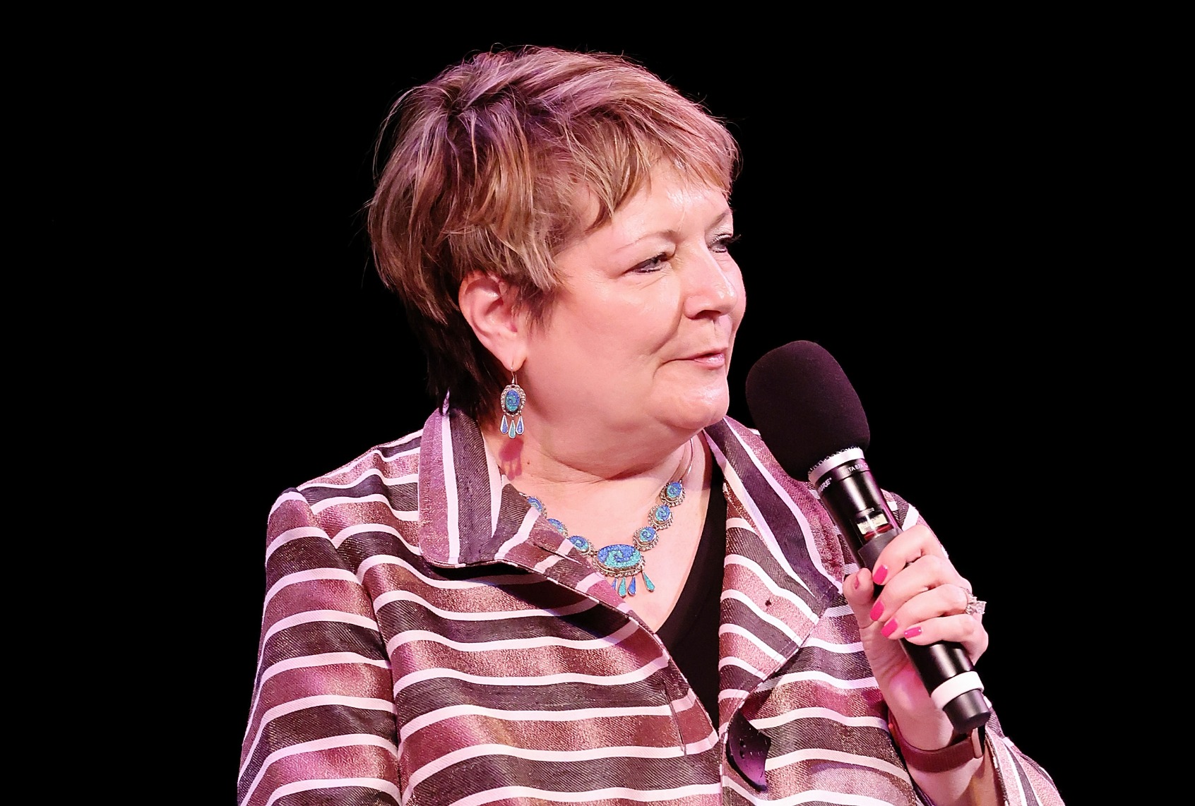 Judge Janet Protasiewicz speaks onstage during the live taping of "Pod Save America," hosted by WisDems at the Barrymore Theater on March 18, 2023 in Madison, Wisconsin. (Jeff Schear/Getty Images for WisDems)