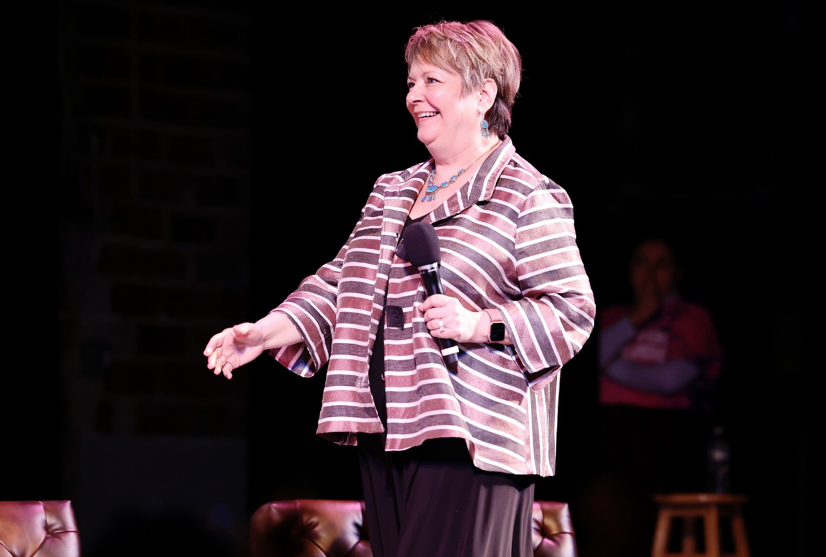 Judge Janet Protasiewicz onstage during the live taping of "Pod Save America," hosted by WisDems at the Barrymore Theater on March 18, 2023 in Madison, Wisconsin. (Jeff Schear/Getty Images for WisDems)