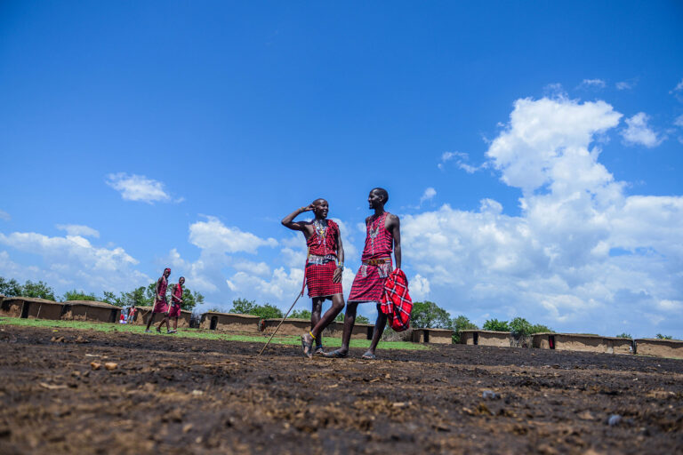 People from Masai community, one of the oldest tribes in East Africa, living in a semi-nomadic state, preserving their traditions in Masai Mara, 290 kilometers to Kenya's capital Nairobi are seen during their daily life on March 04, 2023. (Gerald Anderson/Anadolu Agency via Getty Images)
