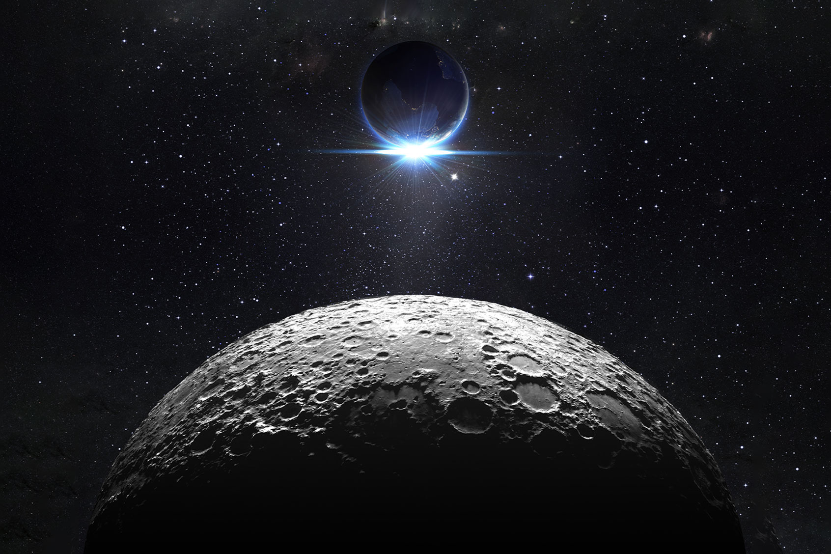 Moon surface with view sunrise of the earth (Getty Images/RomoloTavani)