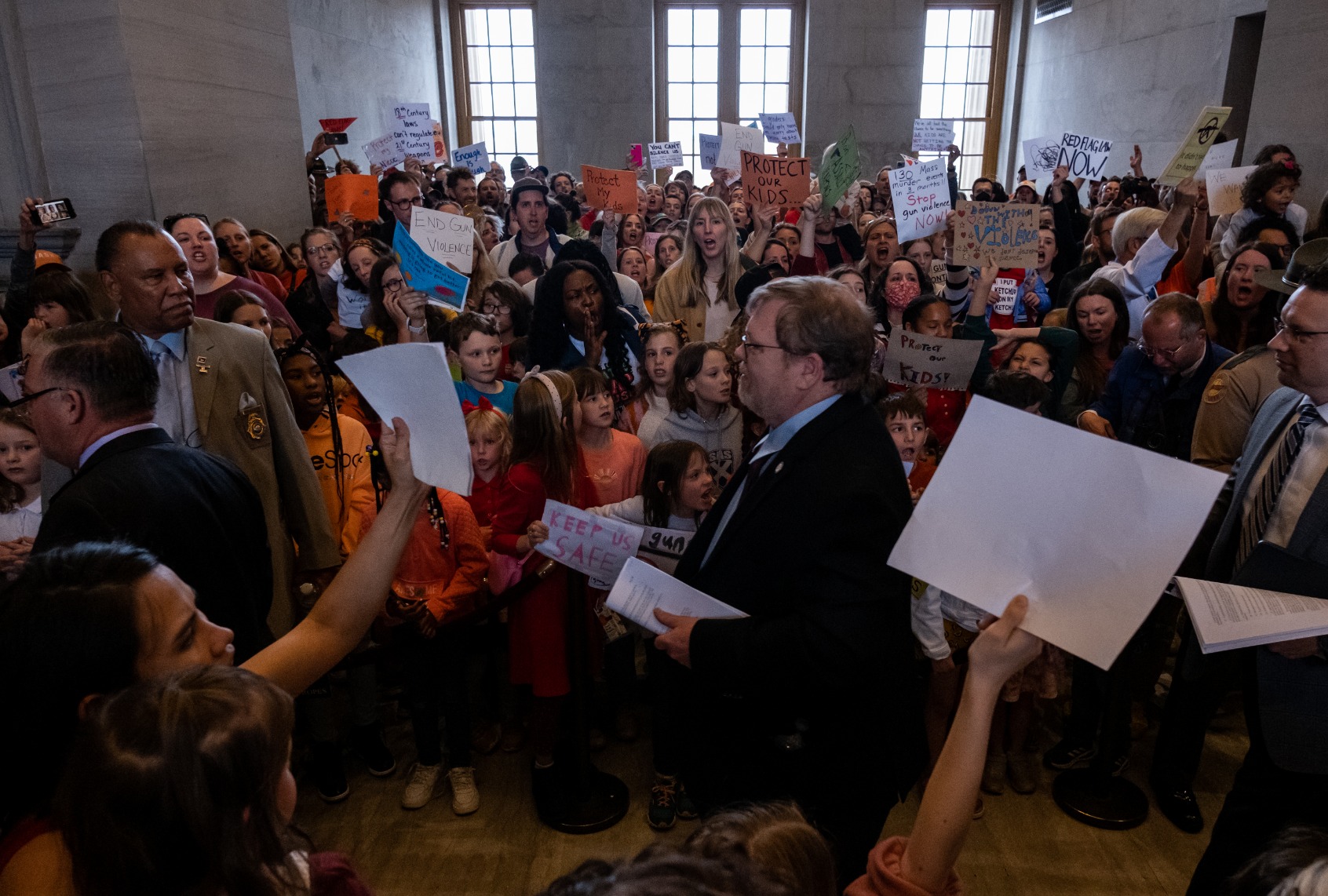 Tennessee state representives enter the house chamber ahead of session as protesters chant demanding action for gun reform laws in the state at the Tennessee State Capitol on April 3, 2023 in Nashville, Tennessee. (Seth Herald/Getty Images)