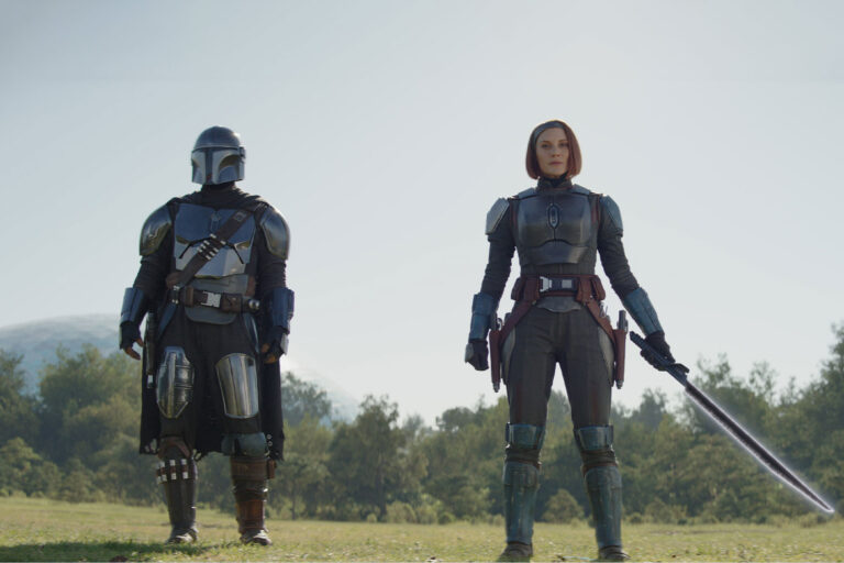 Din Djarin (Pedro Pascal) and Bo-Katan Kryze (Katee Sackhoff) with the Darksaber in "The Mandalorian" (Disney+/Lucasfilm Ltd.)