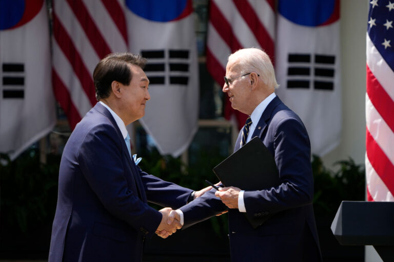 U.S. President Joe Biden (R) and South Korean President Yoon Suk-yeol shake hands during a joint press conference in the Rose Garden at the White House, April 26, 2023 in Washington, DC. (Drew Angerer/Getty Images)