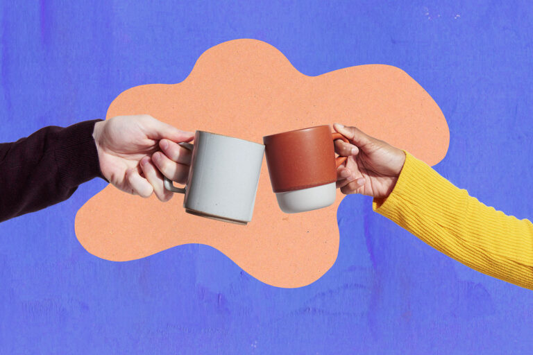 Clinking two coffee mugs (Getty Images/We Are)