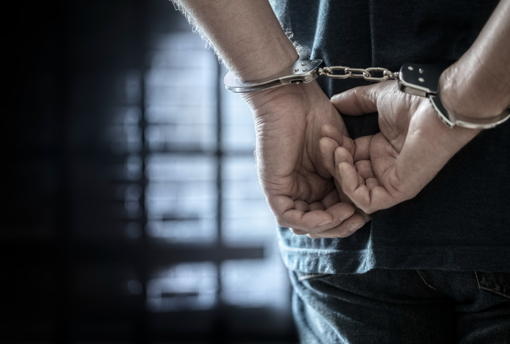 Handcuffed man (Getty/BrianAJackson)
