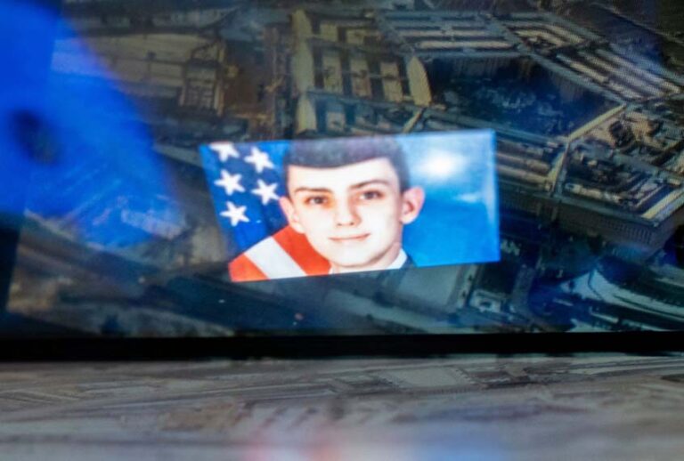 This photo illustration created on April 13, 2023, shows the Discord logo and the suspect, national guardsman Jack Teixeira, reflected in an image of the Pentagon in Washington, DC. - FBI agents on Thursday arrested a young national guardsman suspected of being behind a major leak of sensitive US government secrets -- including about the Ukraine war. US Attorney General Merrick Garland announced the arrest made "in connection with an investigation into alleged unauthorized removal, retention and transmission of classified national defense information." (Photo by STEFANI REYNOLDS/AFP via Getty Images)