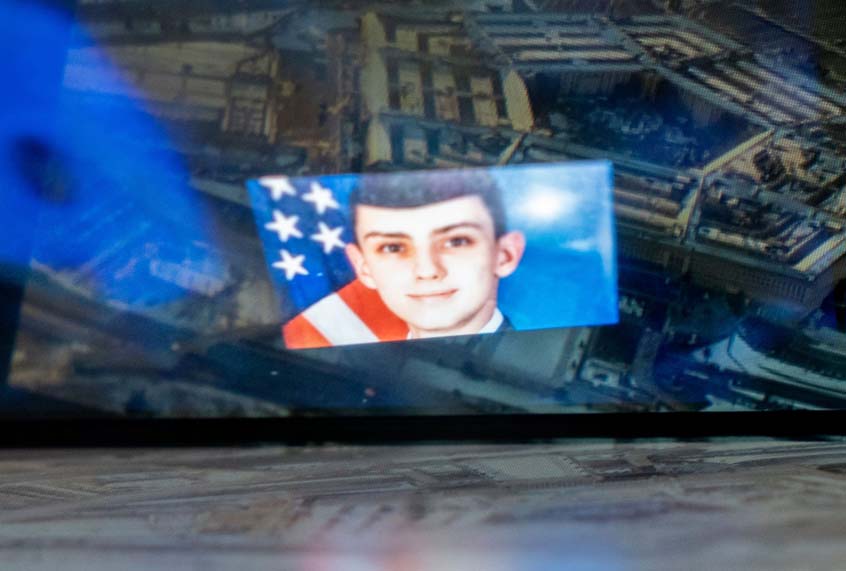This photo illustration created on April 13, 2023, shows the Discord logo and the suspect, national guardsman Jack Teixeira, reflected in an image of the Pentagon in Washington, DC. - FBI agents on Thursday arrested a young national guardsman suspected of being behind a major leak of sensitive US government secrets -- including about the Ukraine war. US Attorney General Merrick Garland announced the arrest made "in connection with an investigation into alleged unauthorized removal, retention and transmission of classified national defense information." (Photo by STEFANI REYNOLDS/AFP via Getty Images)