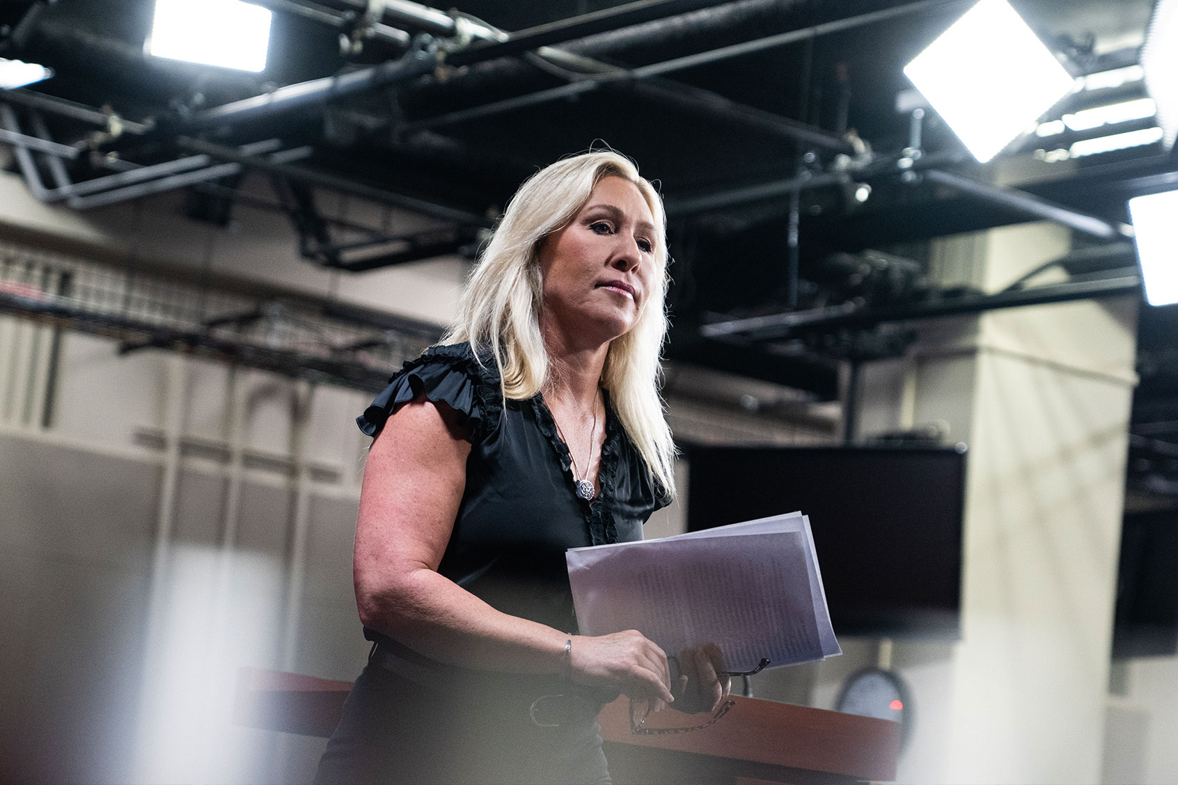 Rep. Marjorie Taylor Greene, R-Ga., concludes a news conference in the Capitol Visitor Center on her plans to file articles of impeachment against President Biden on Thursday, May 18, 2023. (Tom Williams/CQ-Roll Call, Inc via Getty Images)