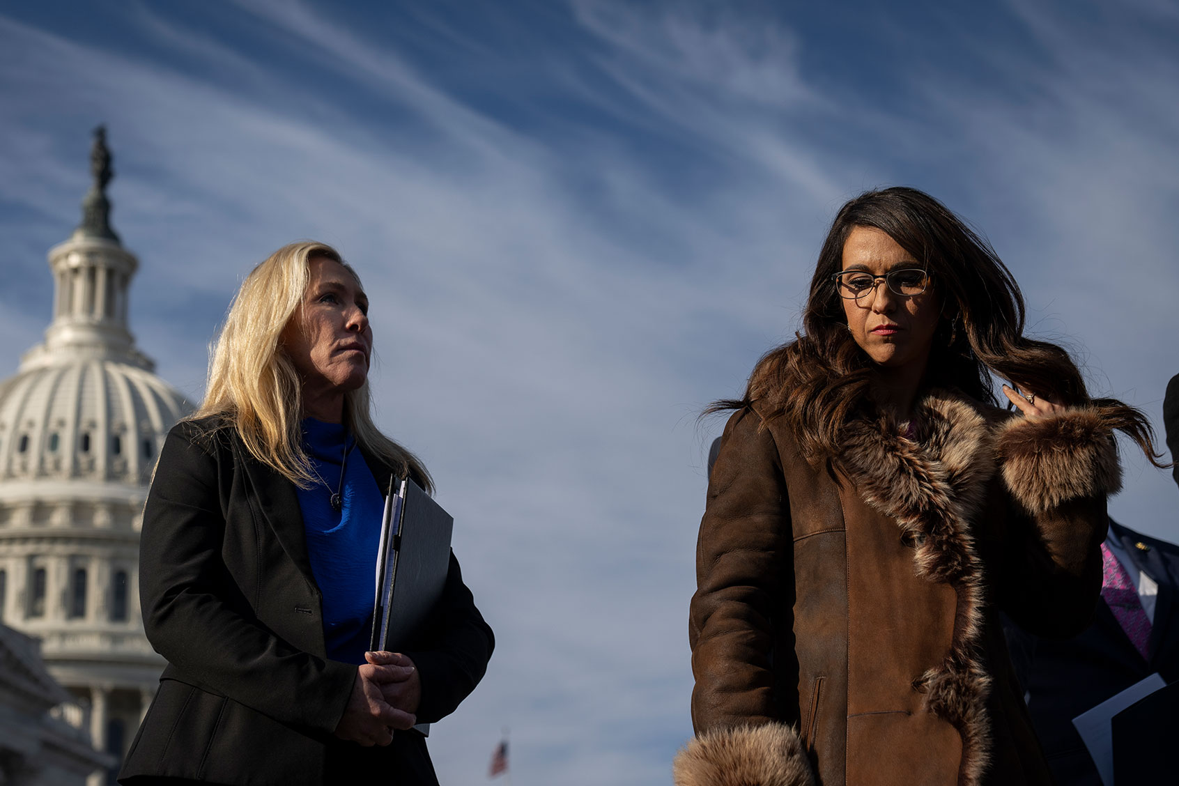 U.S. Rep. Marjorie Taylor Greene (R-GA) and U.S. Rep. Lauren Boebert (R-CO) wait their turn to speak during a news conference outside the U.S. Capitol on February 1, 2023 in Washington, DC. (Drew Angerer/Getty Images)