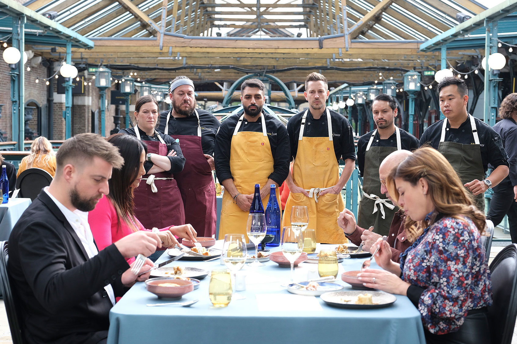 Kirk Westaway, Padma Lakshmi, Sara Bradley, Amar Santana, Ali Al Ghzawi, Tom Goetter, Gabriel Rodriguez, Tom Colicchio, Gail Simmons and Buddha Lo in "Top Chef" (David Moir/Bravo)