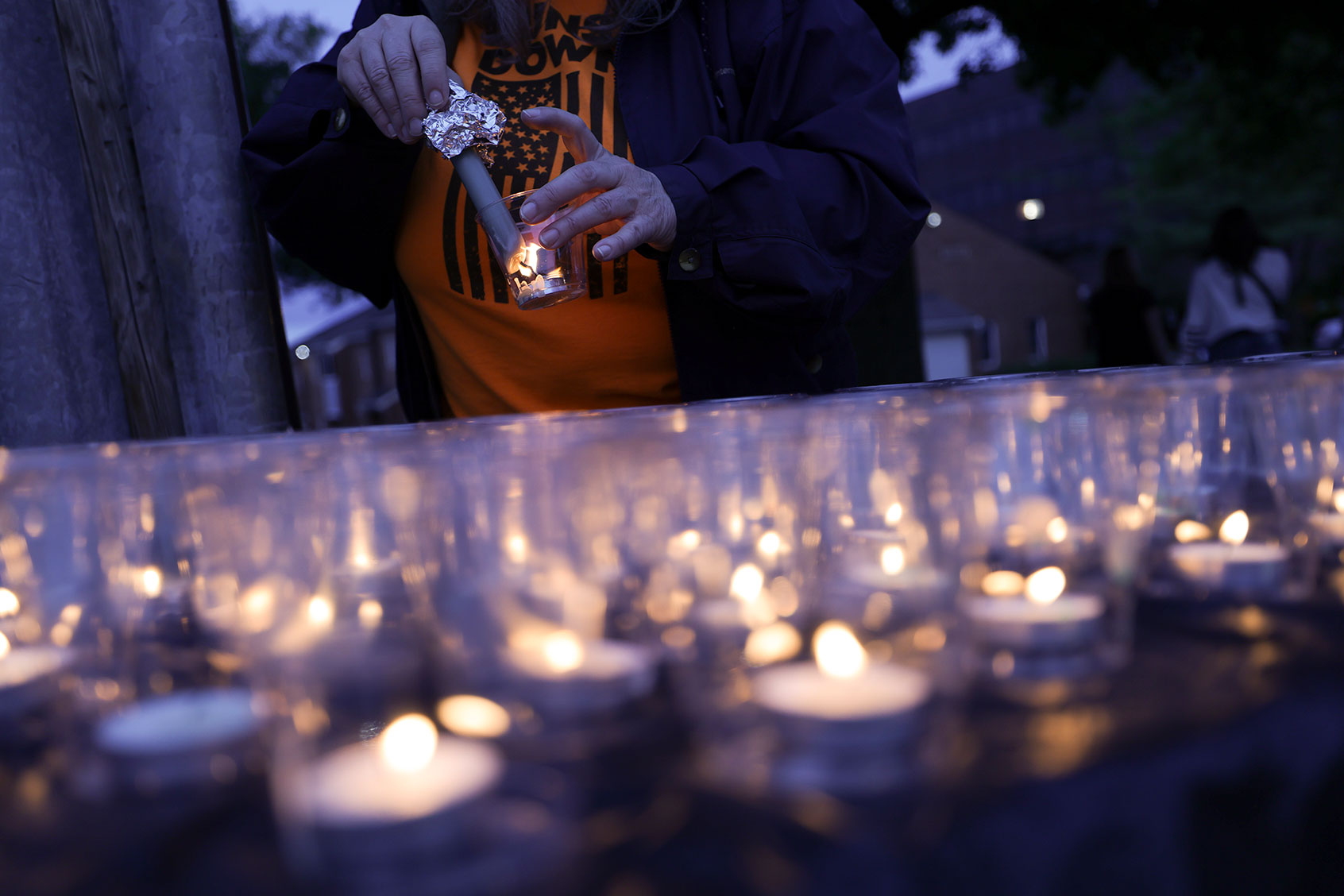 Gun-control advocates hold a vigil outside of the National Rifle Association (NRA) headquarters following the recent mass shooting at Robb Elementary School on May 25, 2022 in Fairfax, Virginia. (Kevin Dietsch/Getty Images)