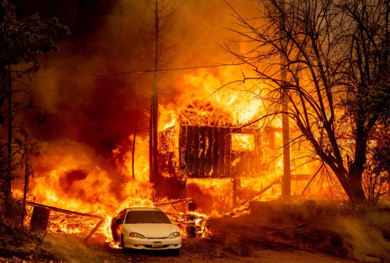 A home is engulfed in flames as the Dixie fire rages on in Greenville, California on August 5, 2021. (JOSH EDELSON/AFP via Getty Images)