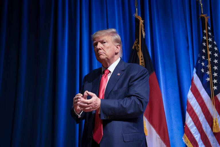 Republican presidential candidate former U.S. President Donald Trump leaves the stage after delivering remarks June 10, 2023 in Greensboro, North Carolina. (Win McNamee/Getty Images)