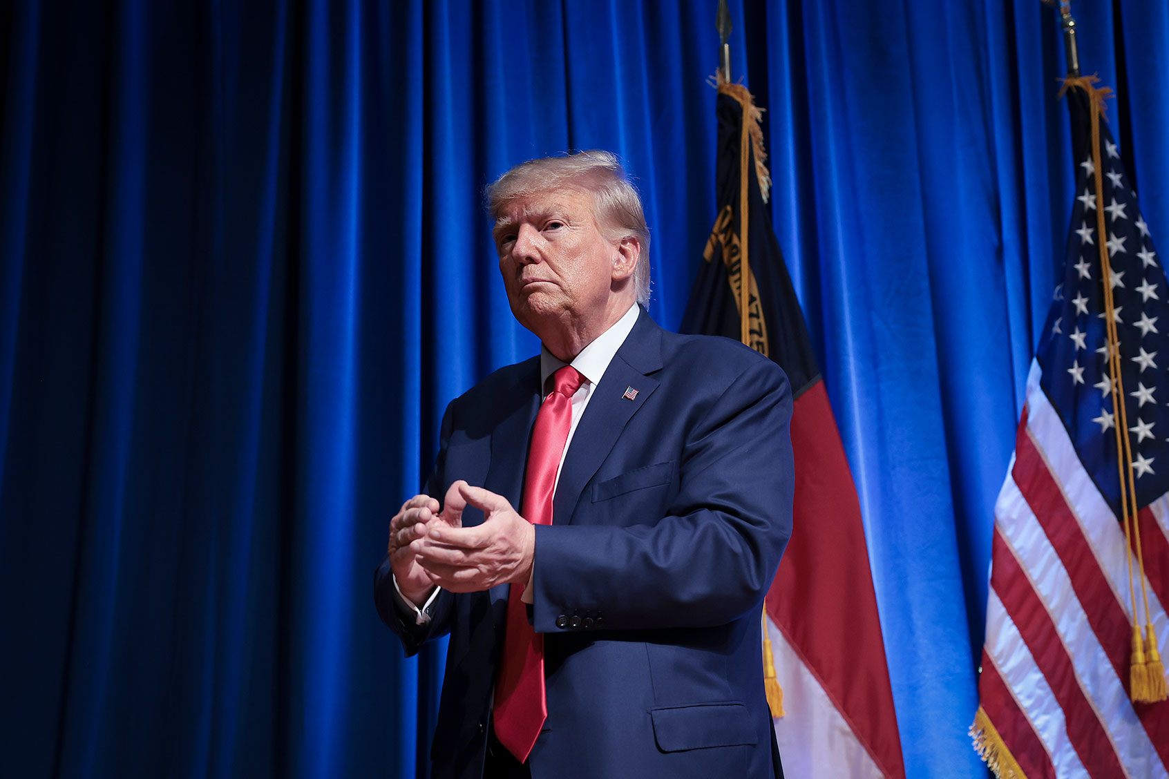 Republican presidential candidate former U.S. President Donald Trump leaves the stage after delivering remarks June 10, 2023 in Greensboro, North Carolina. (Win McNamee/Getty Images)