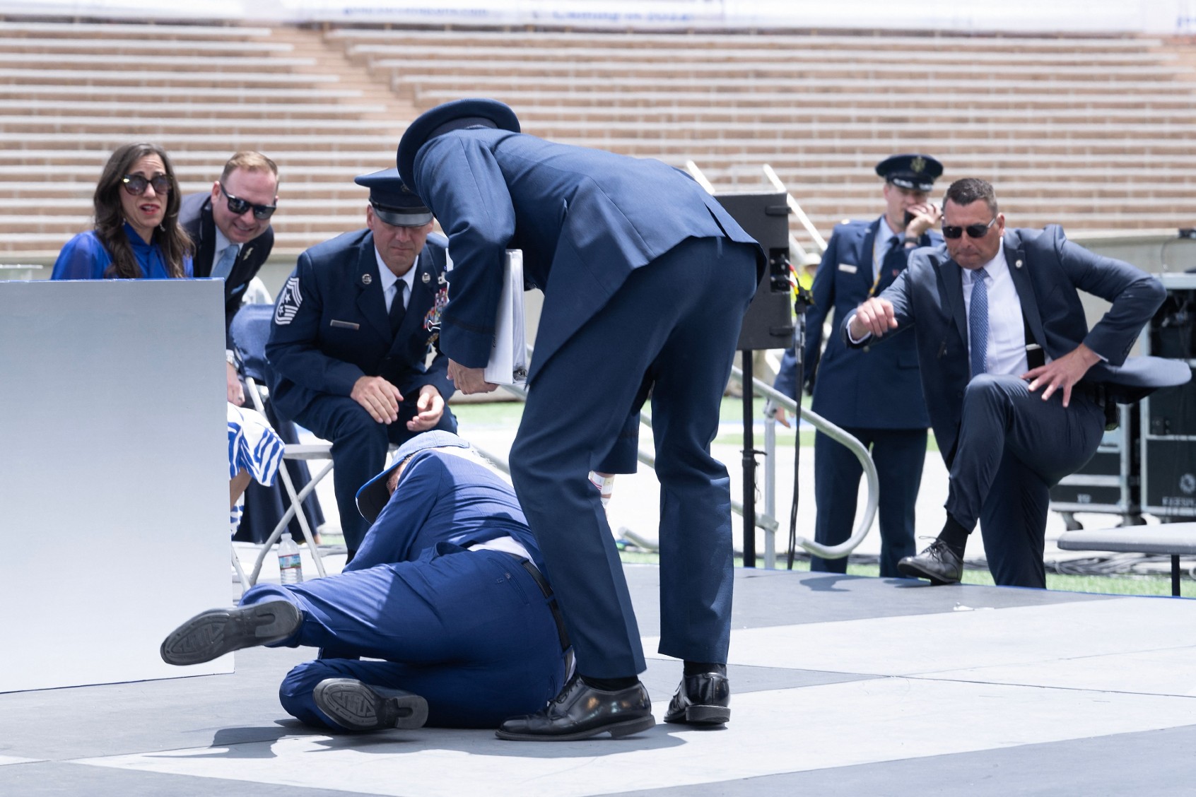 President Joe Biden falls during the graduation ceremony at the United States Air Force Academy, just north of Colorado Springs in El Paso County, Colorado, on June 1, 2023. (BRENDAN SMIALOWSKI/AFP via Getty Images)