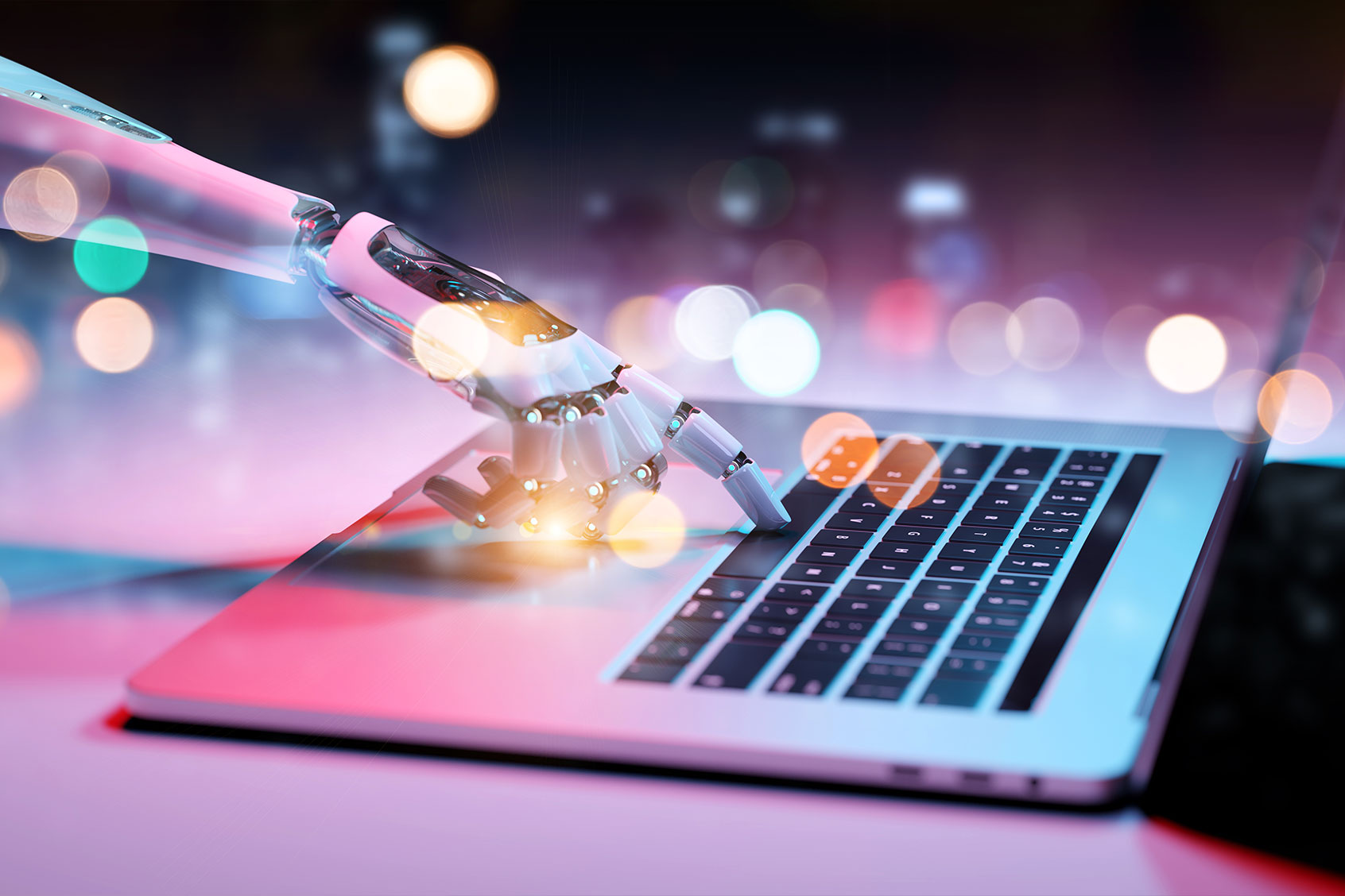 Robotic hand pressing a key on a laptop (Getty Images/Guillaume)