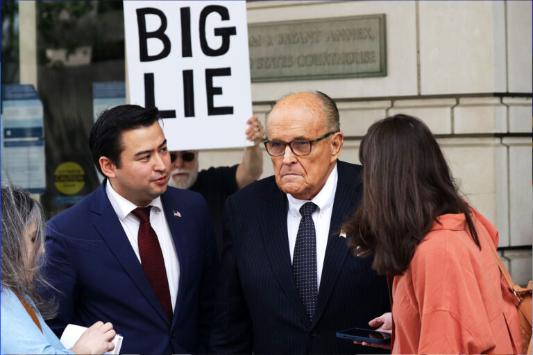Former New York City Mayor and former personal lawyer for former President Donald Trump Rudy Giuliani talks to members of the press before he leaves the U.S. District Court on May 19, 2023 in Washington, DC. (Alex Wong/Getty Images)