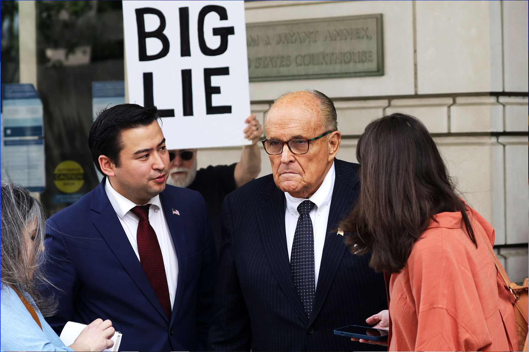 Former New York City Mayor and former personal lawyer for former President Donald Trump Rudy Giuliani talks to members of the press before he leaves the U.S. District Court on May 19, 2023 in Washington, DC. (Alex Wong/Getty Images)