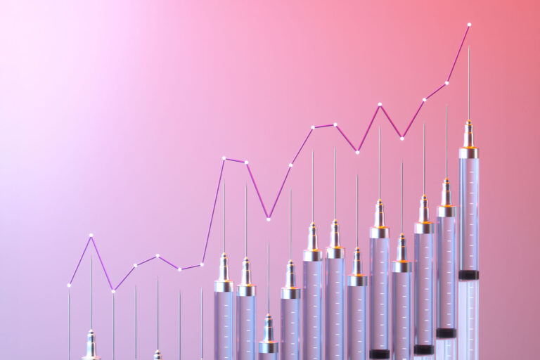Vaccines in an upward line graph (Getty Images/Andriy Onufriyenko)