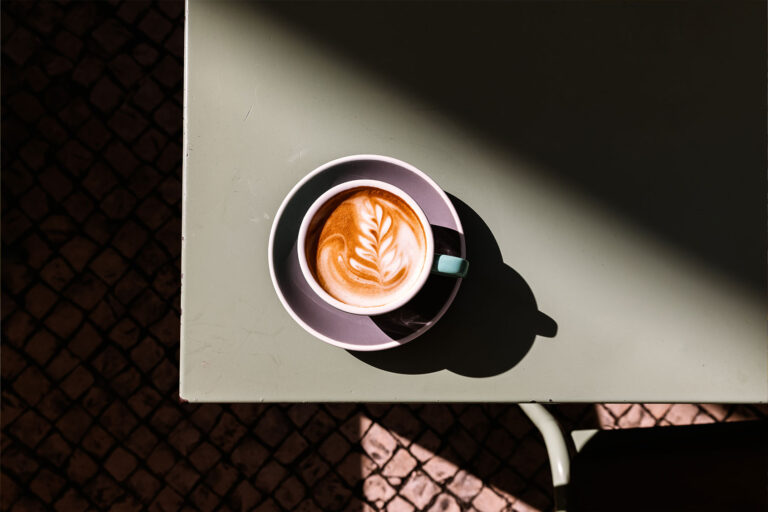 Cappuccino with latte art on the table (Getty Images/Alexander Spatari)