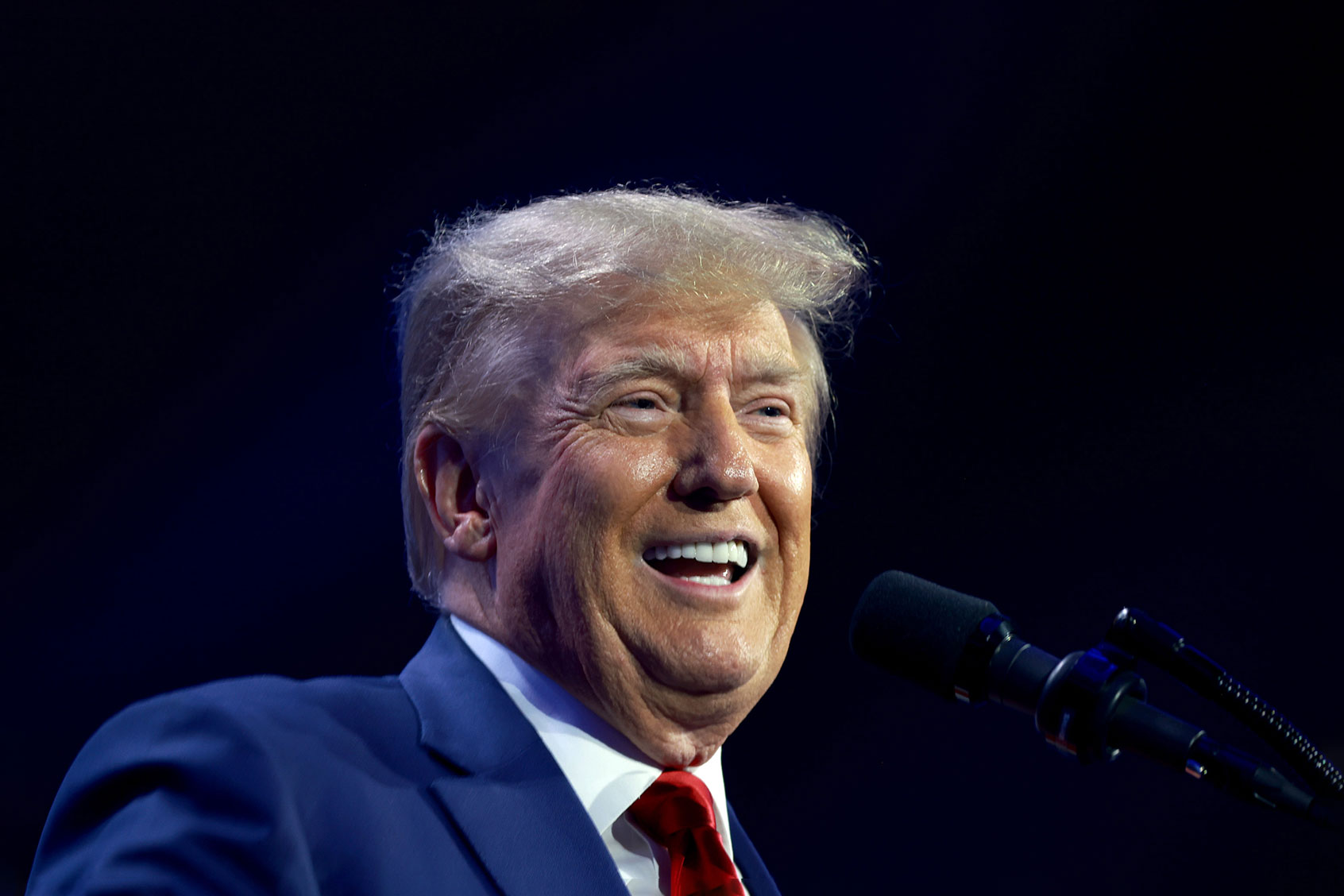Former US President Donald Trump speaks at the Turning Point Action conference as he continues his 2024 presidential campaign on July 15, 2023 in West Palm Beach, Florida. (Joe Raedle/Getty Images)