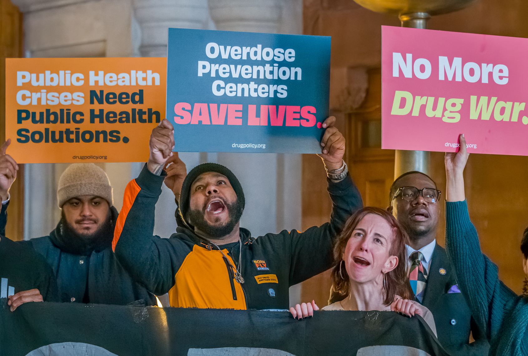 CAPITOL BUILDING, ALBANY, NEW YORK, UNITED STATES - 2023/01/31: Participants seen holding signs at the event. VOCAL-NY gathered at The War Room in the New York State Capitol with allies, including members of Drug Policy Alliance, OnPoint NYC, P.A.I.N Sackler, Housing Works and staff from the nations first Overdose Prevention Centers, for a press conference to push back against Governor Hochuls proposed plans to increase criminalization to address the overdose crisis, and demand lawmakers implement harm reduction strategies that -in their opinion- will actually save lives. (Photo by Erik McGregor/LightRocket via Getty Images) (Getty Images )